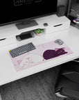 28x12 inches anime mouse pad showing a white smiling kitty and grumpy black cat stretched out side by side.