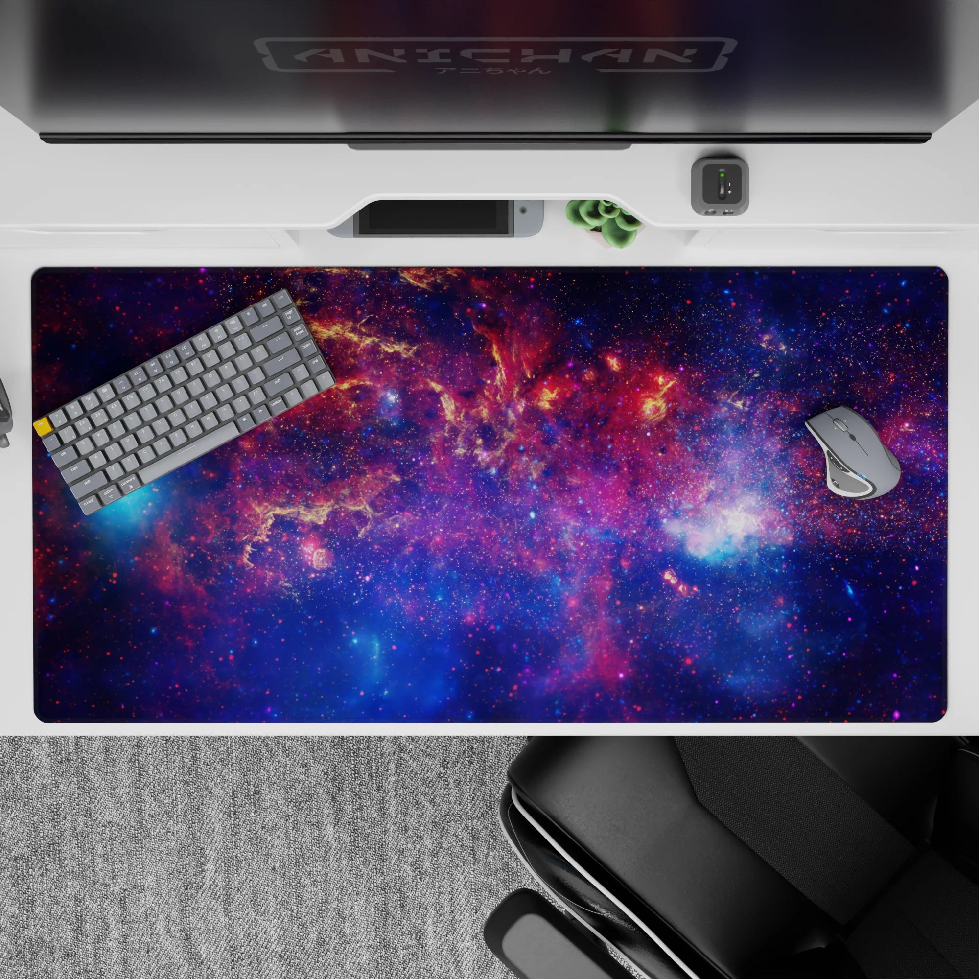 Dreamy late-night sky desk pad in deep violet, midnight blue, and nebula pink, 40x20 inches.