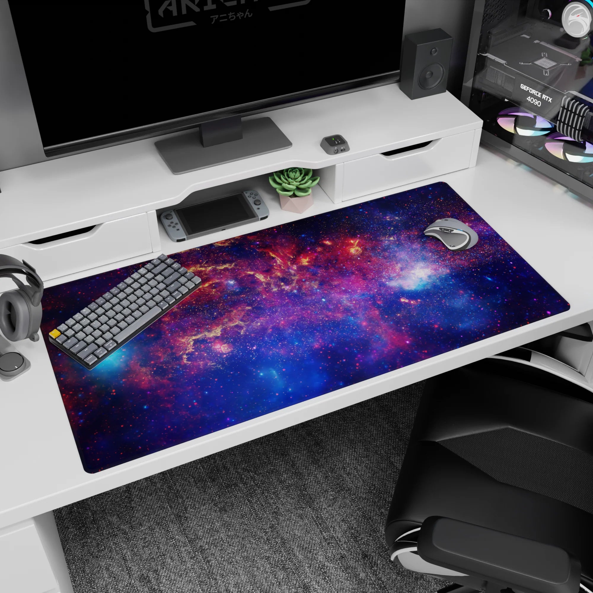 Star-sprinkled nebula scene desk pad with swirling cosmic clouds across the surface, 40x20 inches.