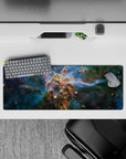 Moody teal-to-deep blue space mouse pad 32x12 inches with soft glows for a calming desk vibe.