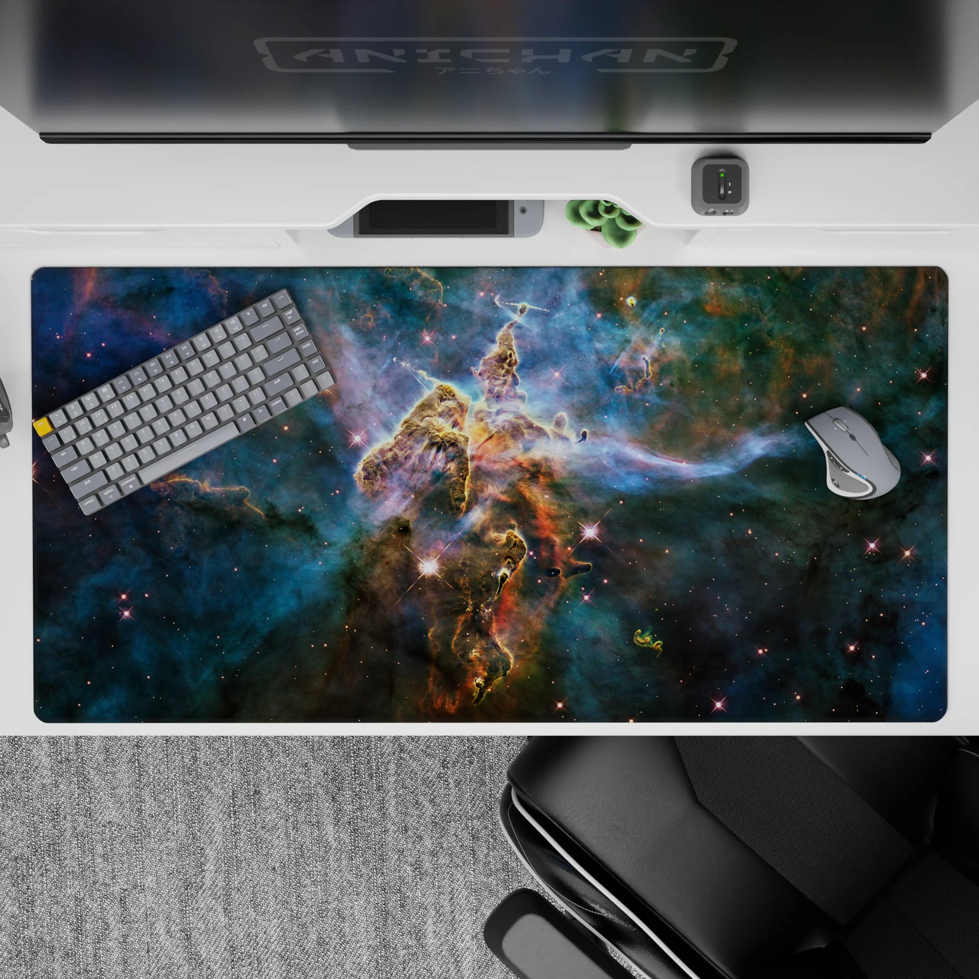 Teal-to-inky blue cosmic desk pad 40x20 inches with soft glow, calm night vibe, and smooth tracking.