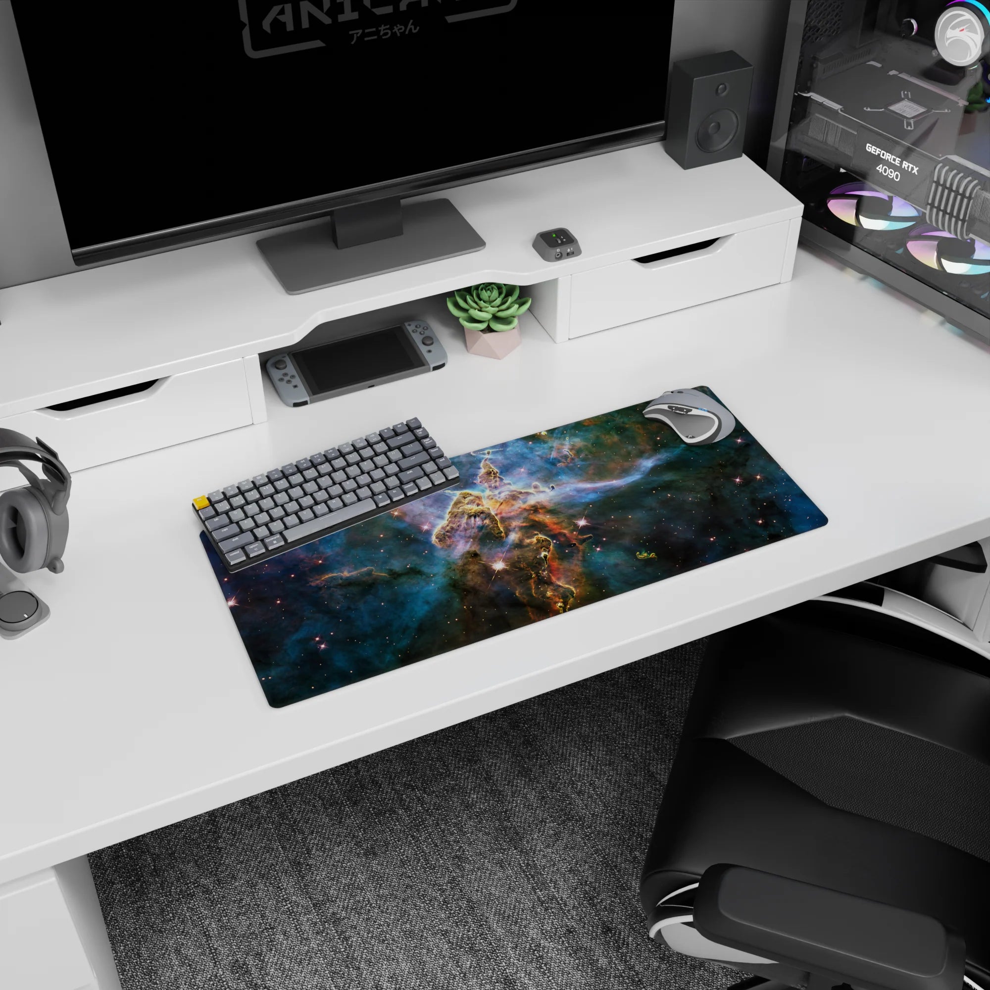 Mouse pad 28x12 inches featuring a bold central pillar of golden stardust in a starry nebula.