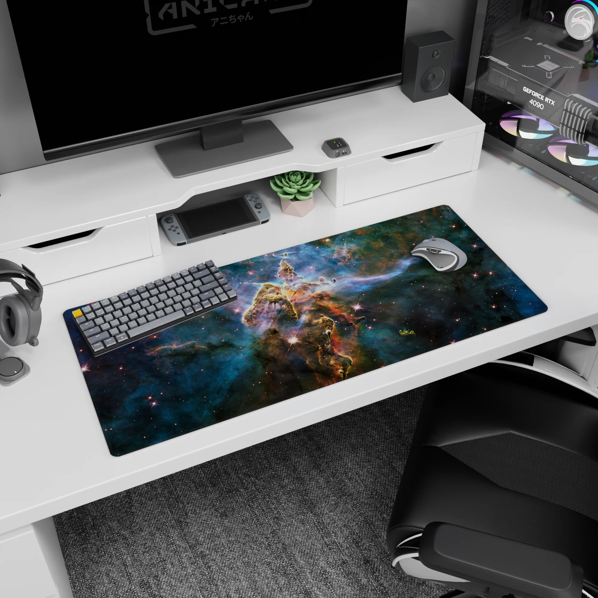 Galaxy desk pad 36x16 inches featuring a central pillar of golden dust amid swirling nebula clouds.