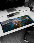 Galaxy desk pad 36x16 inches featuring a central pillar of golden dust amid swirling nebula clouds.