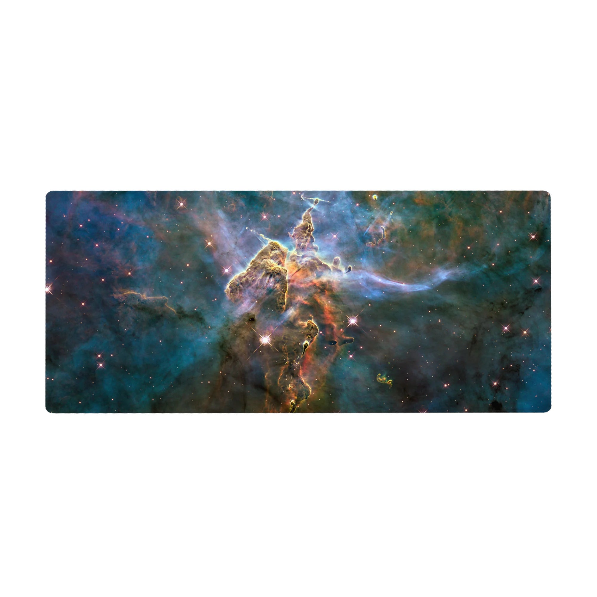 Cosmic nebula desk pad 36x16 inches with teal clouds, inky blues, and starry specks.