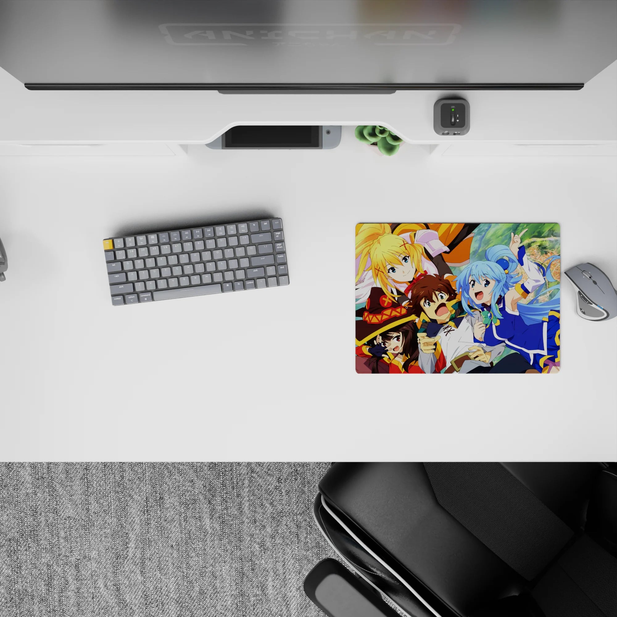 KonoSuba anime mouse pad 14x10 inches featuring Kazuma, Aqua, Darkness, and Megumin in a lively, colorful scene.