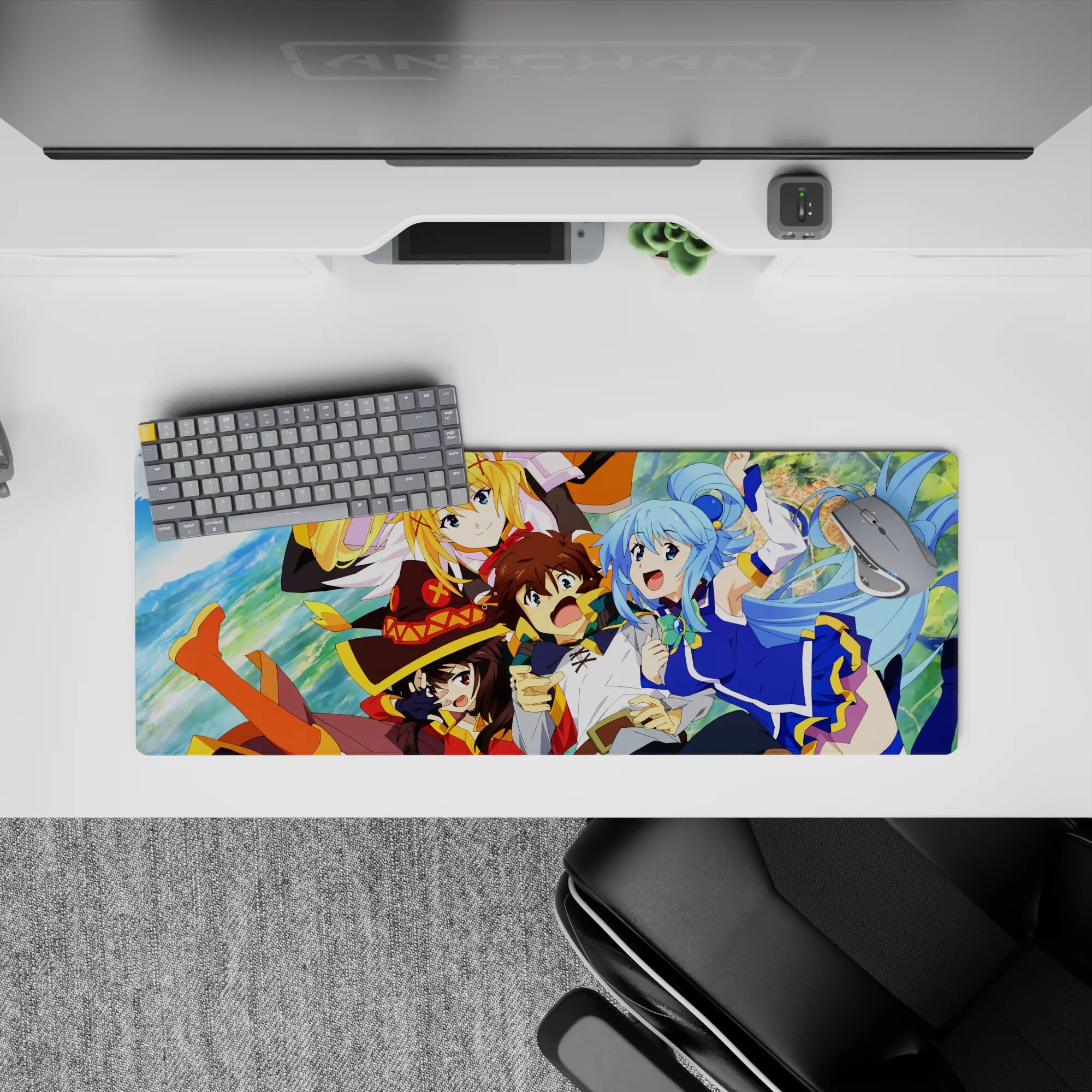 KonoSuba anime mouse pad, 32x12 inches, featuring Kazuma, Aqua, Darkness, and Megumin in a dynamic, colorful scene.