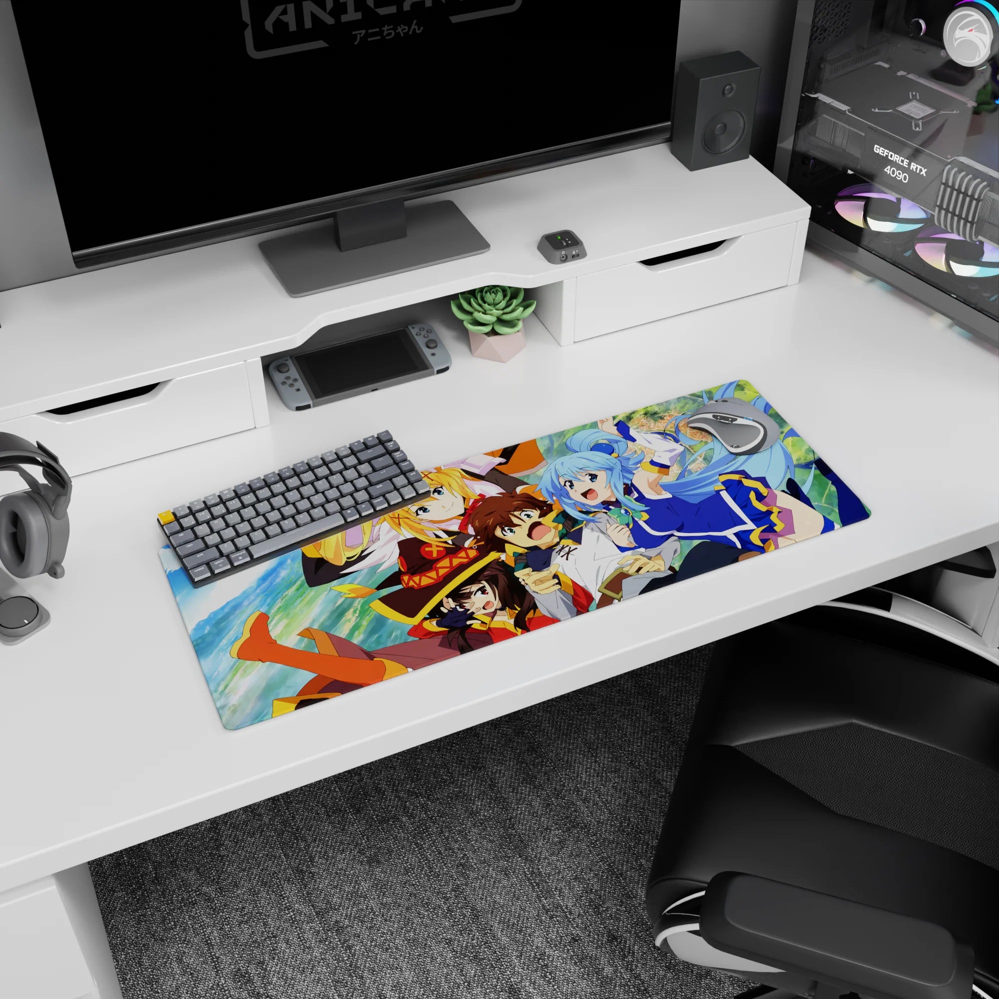 KonoSuba anime mouse pad 32x12 inches featuring Kazuma, Aqua, Darkness, and Megumin in action with vivid colors.