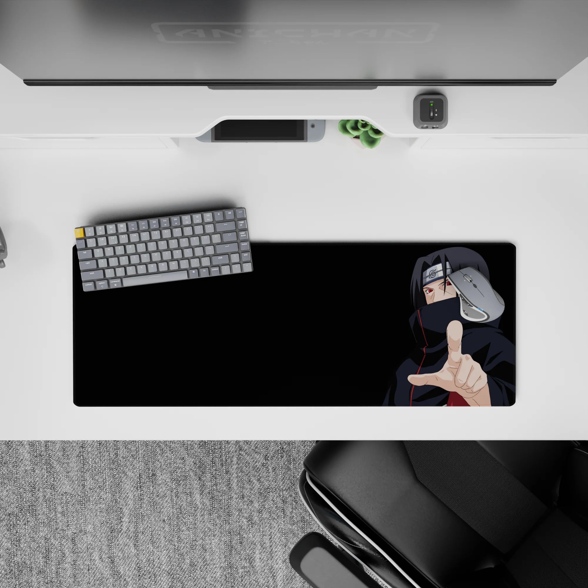 Dark black-and-red 32x12 inches anime desk mat with intense Sharingan mood and crisp red piping.