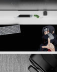Dark black anime desk pad 36x16 inches with crisp red accents and intense Sharingan mood.