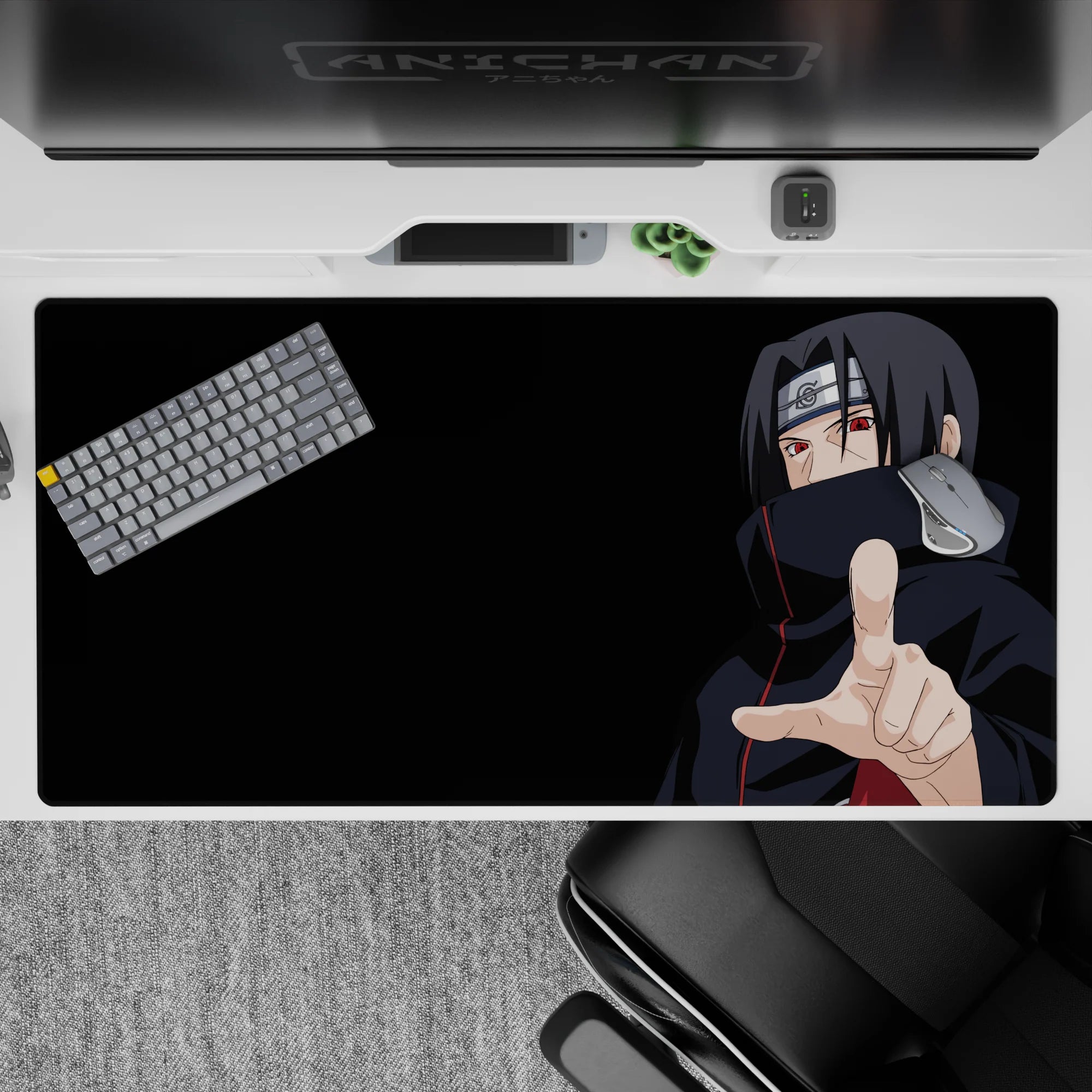 Dark black 40x20 inches anime desk pad with red Akatsuki accents and intense Sharingan eyes mood.