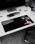 32x16 inches Itachi reaching out mouse pad with calm, dangerous stare and sharp Sharingan eyes.