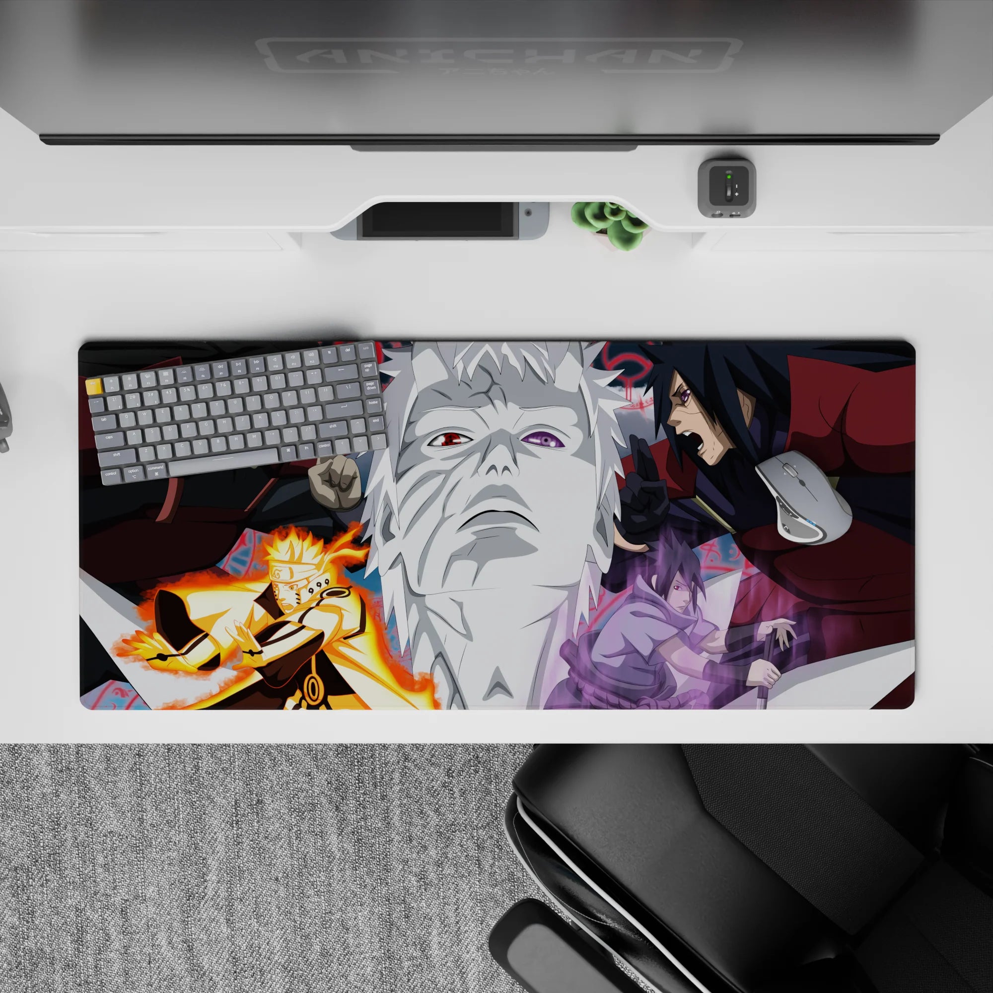 36x16 inches anime desk pad in bold reds and grays with orange chakra and violet energy, clean ink style.