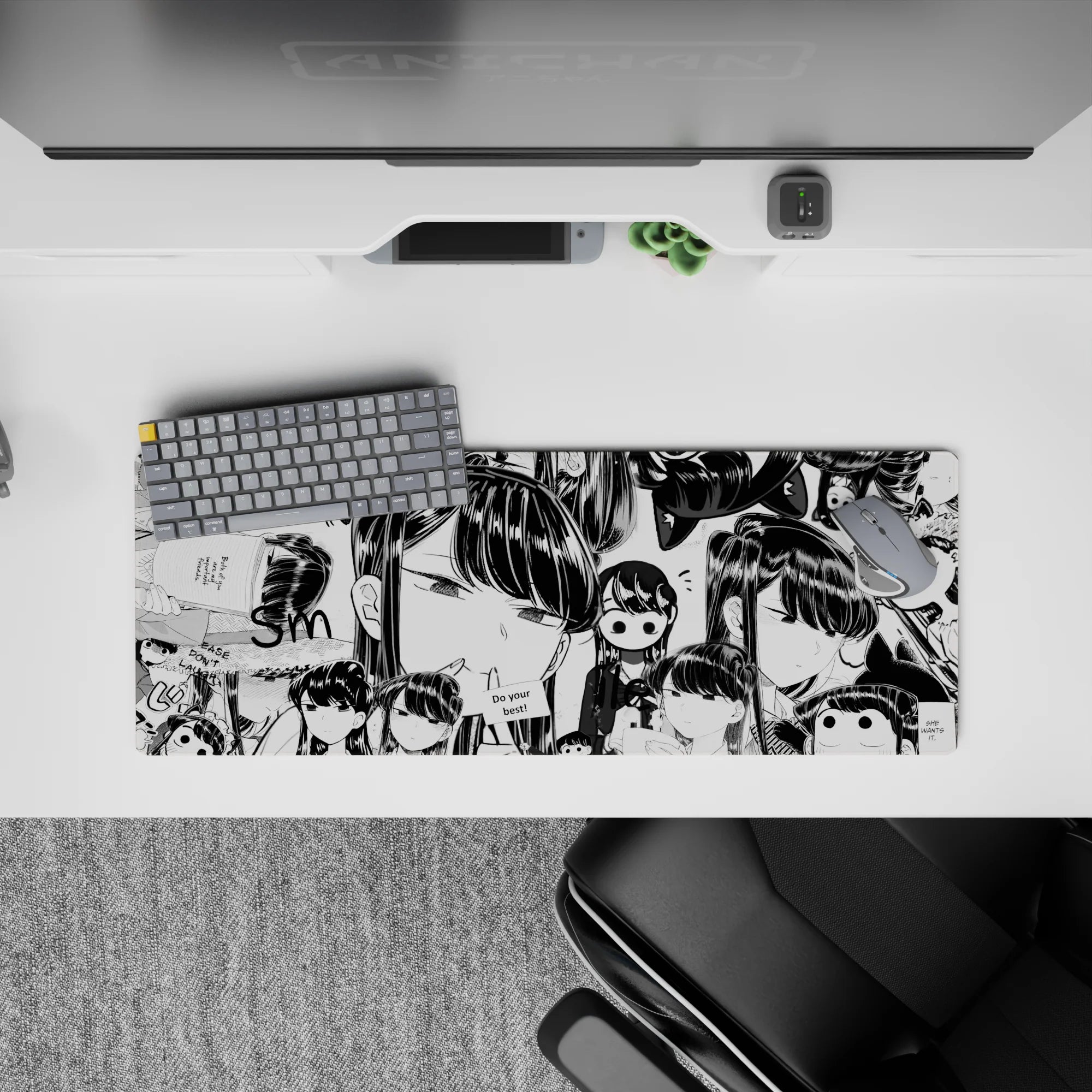 Cozy manga-cute chaos in black-and-white, glossy anime girl mouse pad 32x12 inches for smooth tracking.
