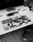 32x16 inches anime girl mouse pad showing wide-eyed chibi girls in a repeating manga panel-style scene.