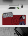 28x12 inches anime mouse pad in deep crimson with subtle Sharingan emblem, bold yet classy vibe.