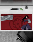 32x16 inches anime mouse pad in deep crimson with subtle Sharingan emblem, calm dark vibe for desk setups.