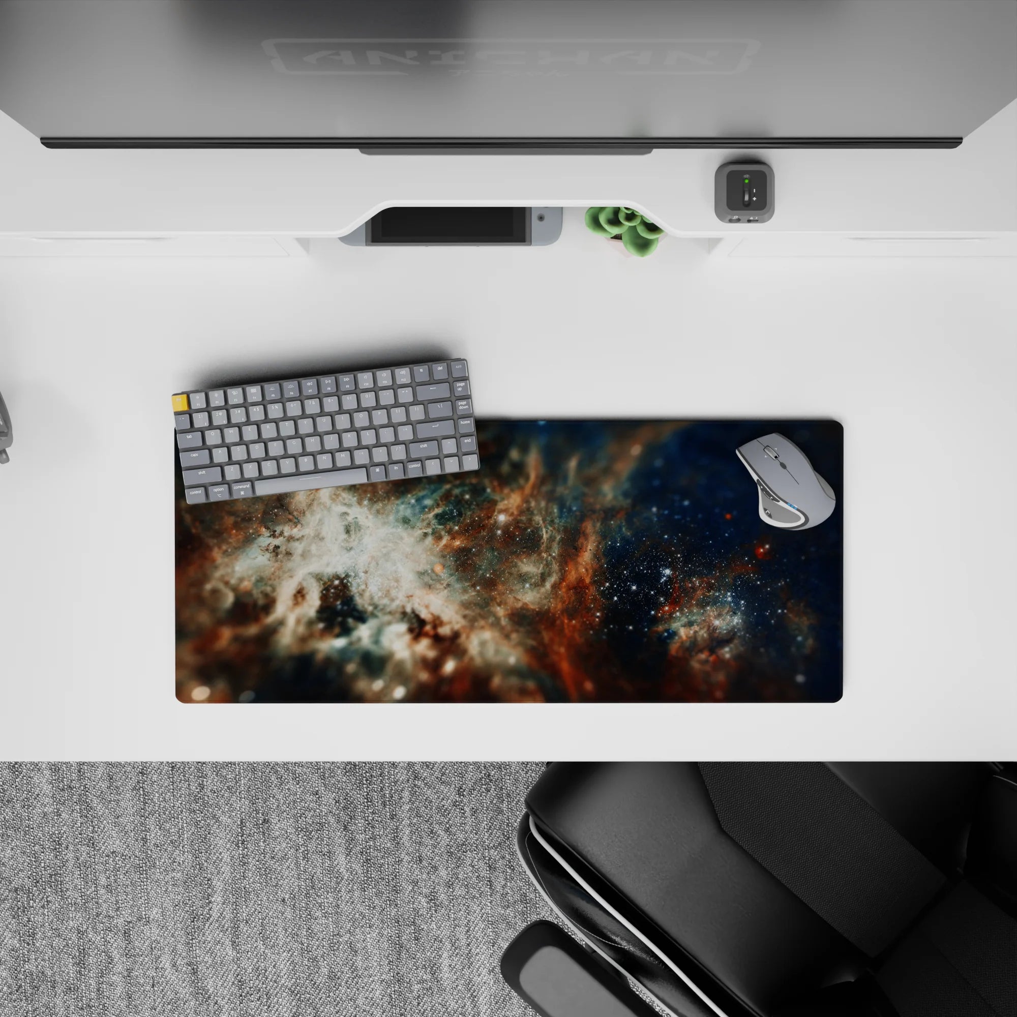 Deep navy and cloud-white with rusty amber accents, 28x12 inches mouse pad with calm night-sky vibe.