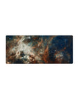 Galaxy nebula desk mouse pad, 28x12 inches, with soft gradients, wispy swirls, and star speckles.