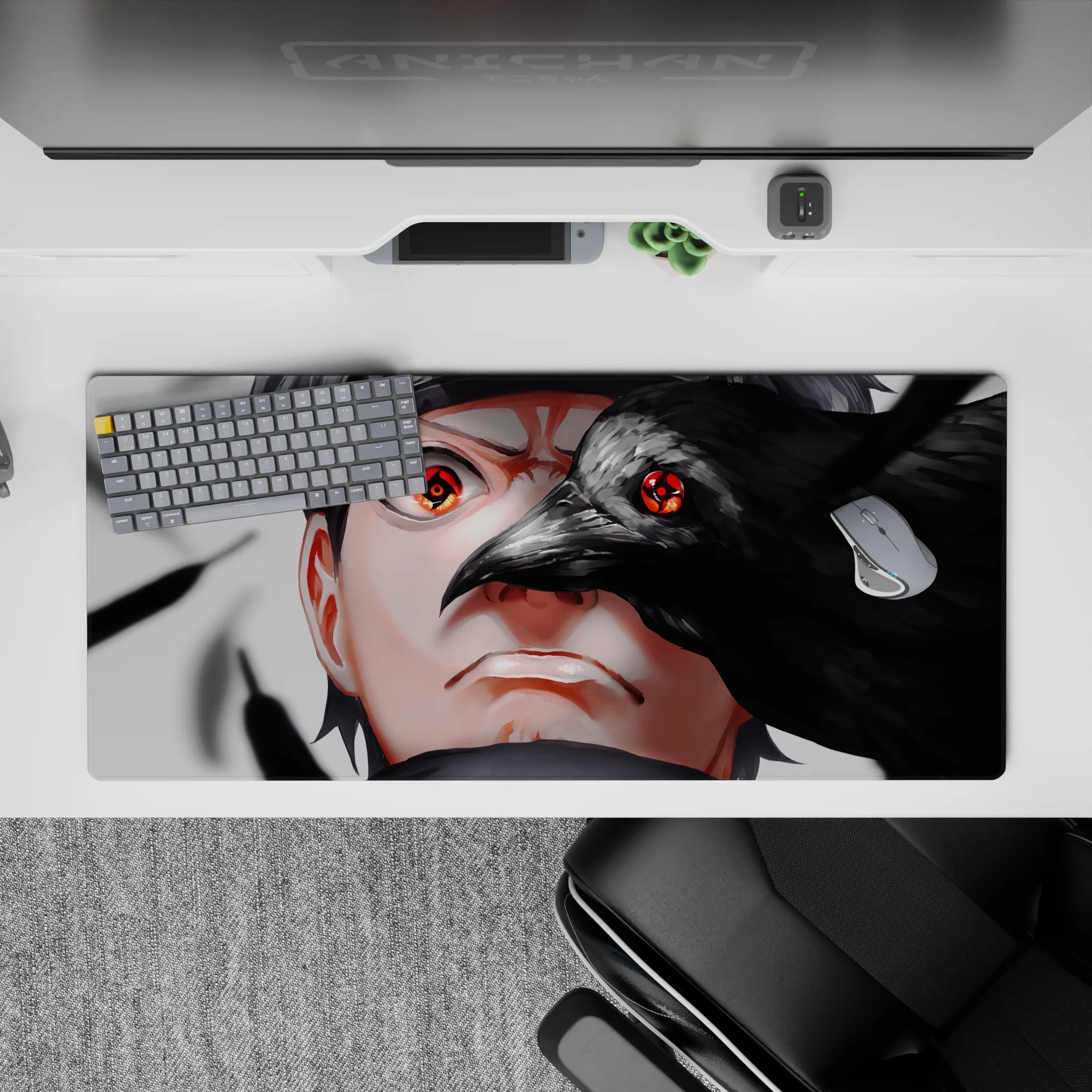36x16 inches Naruto-style desk pad in smoky grays and glossy blacks with a red Sharingan, dark mood.
