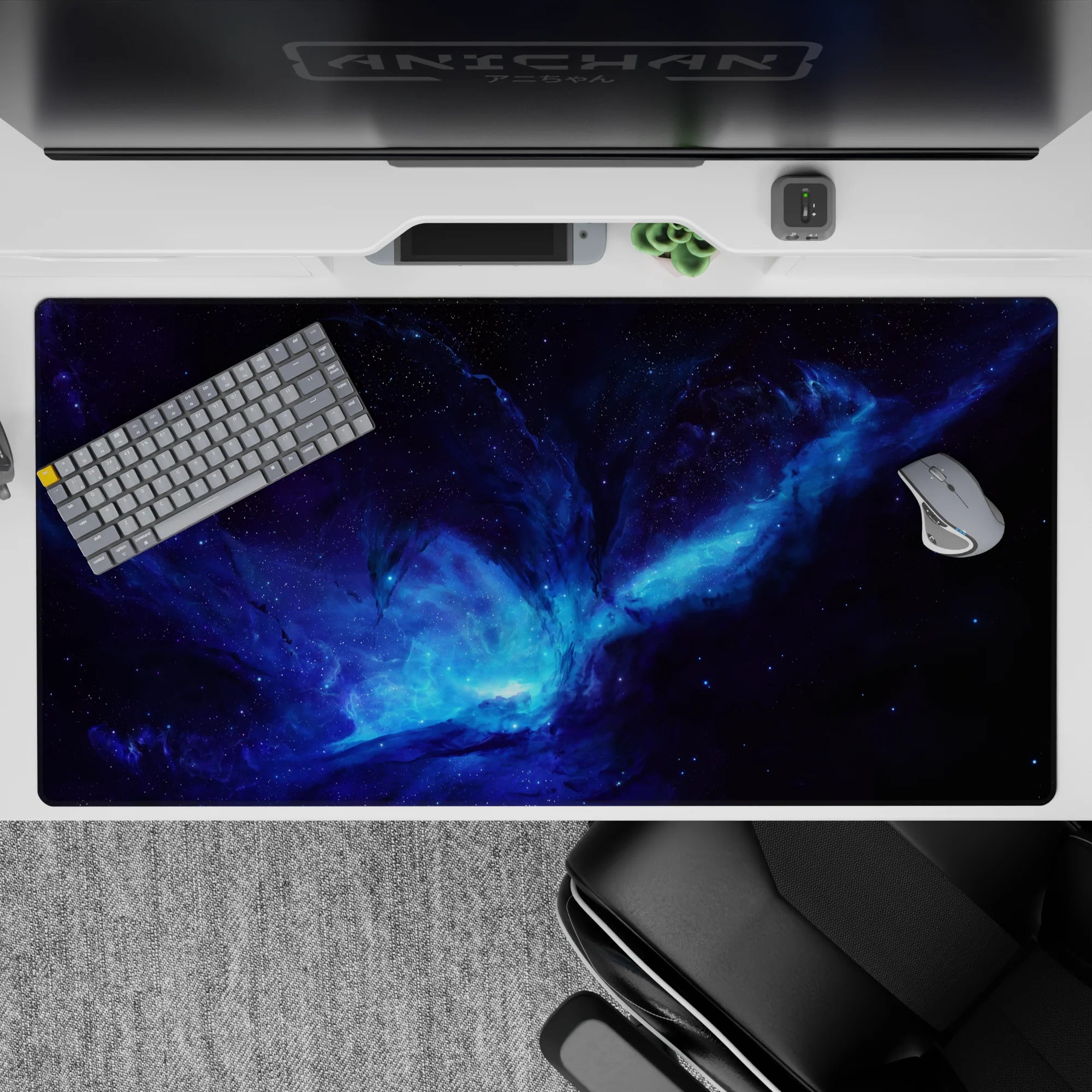 Electric blues and smoky purples galaxy desk pad, calm-to-wild space vibe, 40x20 inches.