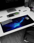 Desk pad 36x16 inches showing an inky space portal-like core surrounded by swirling galaxy dust.