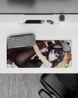Cozy flirty violet-and-black anime girl mouse pad 28x12 inches with warm wood tones and soft blush.