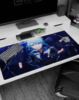 Blue-haired anime girl reaching toward you on desk pad 40x20 inches, bold uniform with star detail.