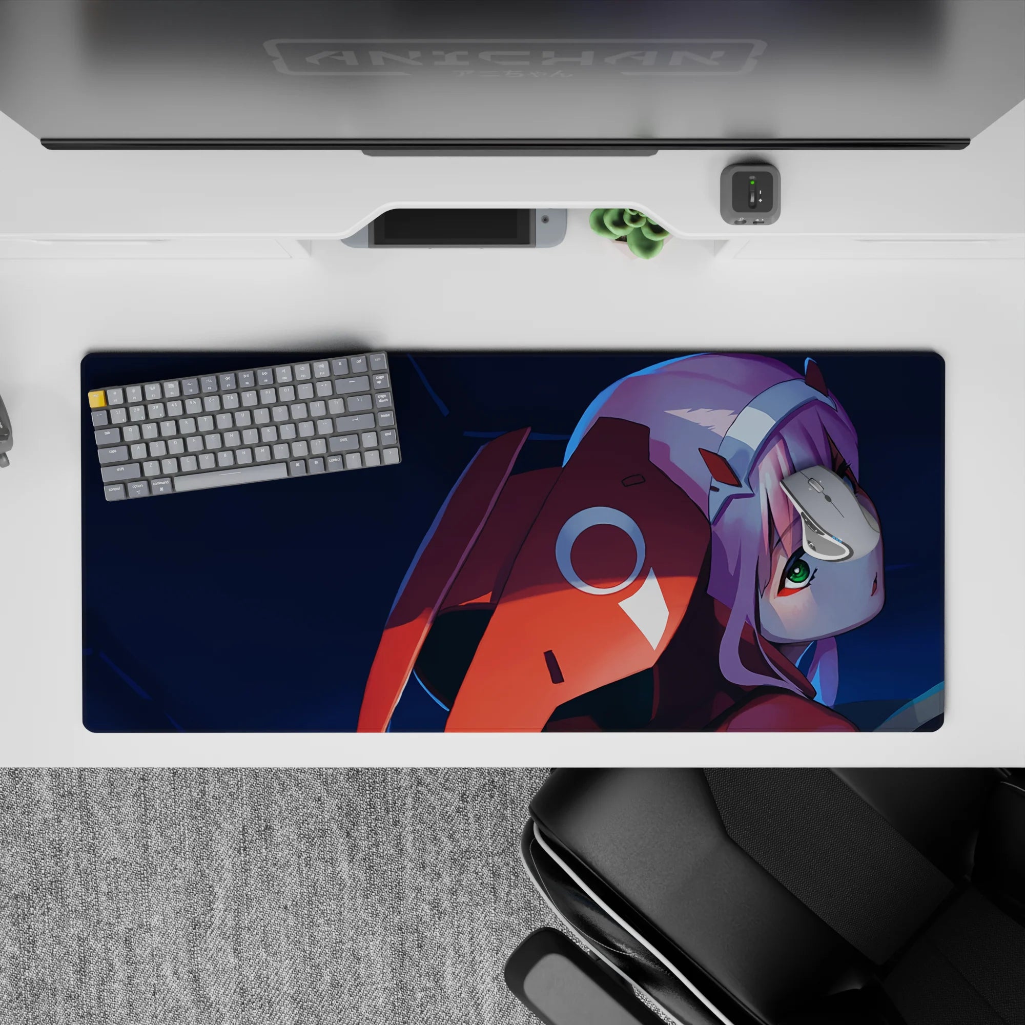 Intense 36x16 desk pad featuring deep blues, fiery reds, and Zero Two’s piercing green eyes for powerful presence