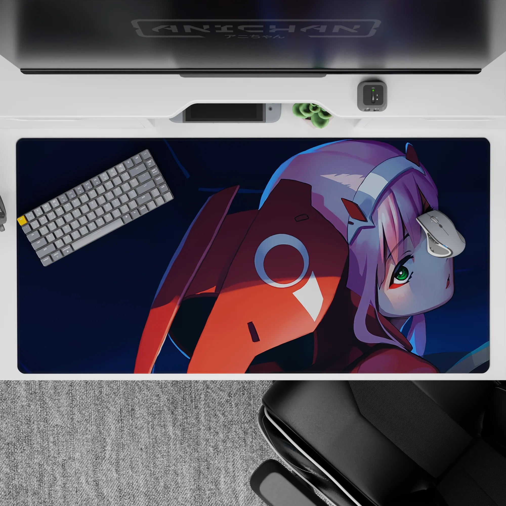 Intense 40x20 desk pad with deep blues, fiery reds, and Zero Two’s piercing green eyes for bold anime presence