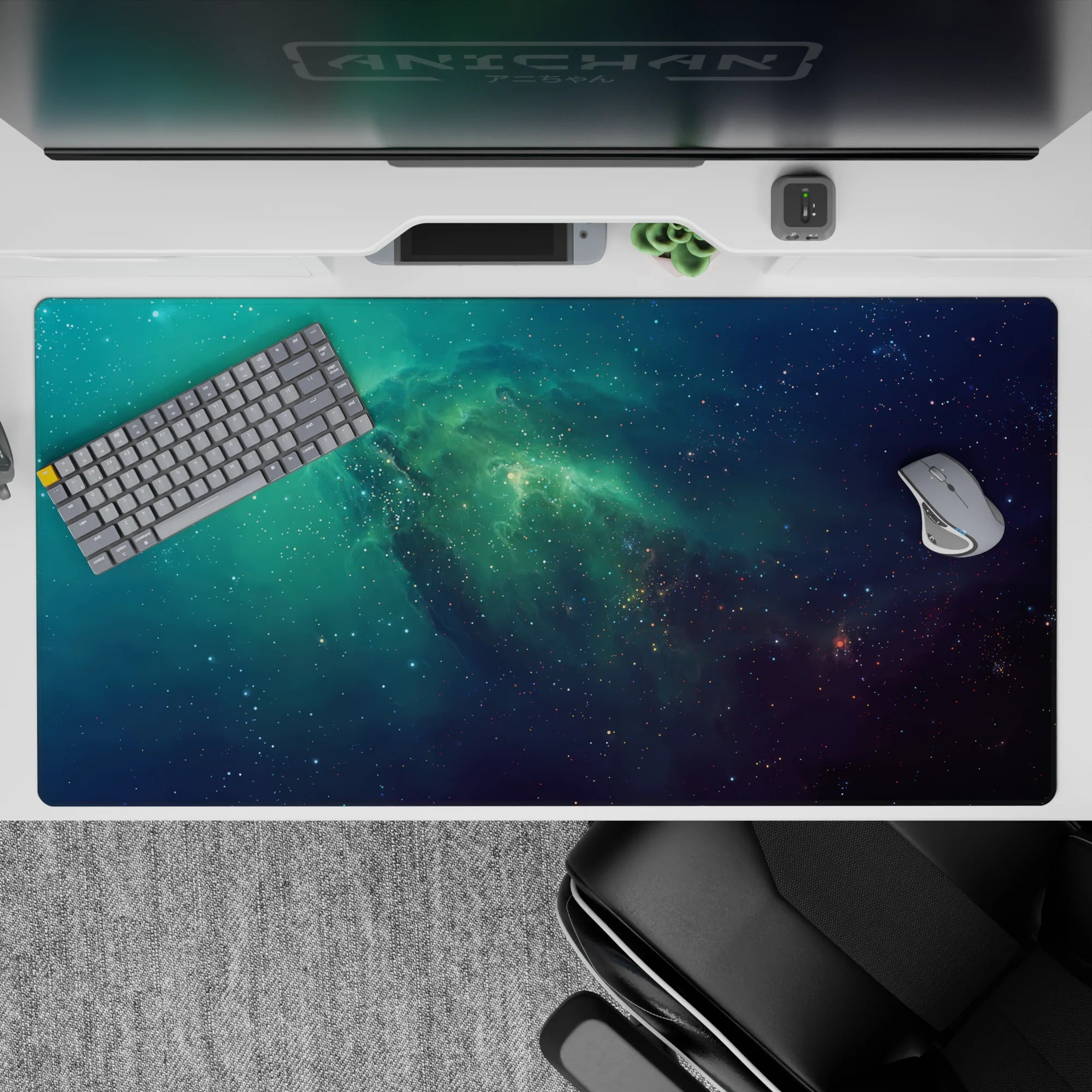 Teal mist on deep navy desk pad, 40x20 inches, calming dreamy cosmic glow for late-night work.
