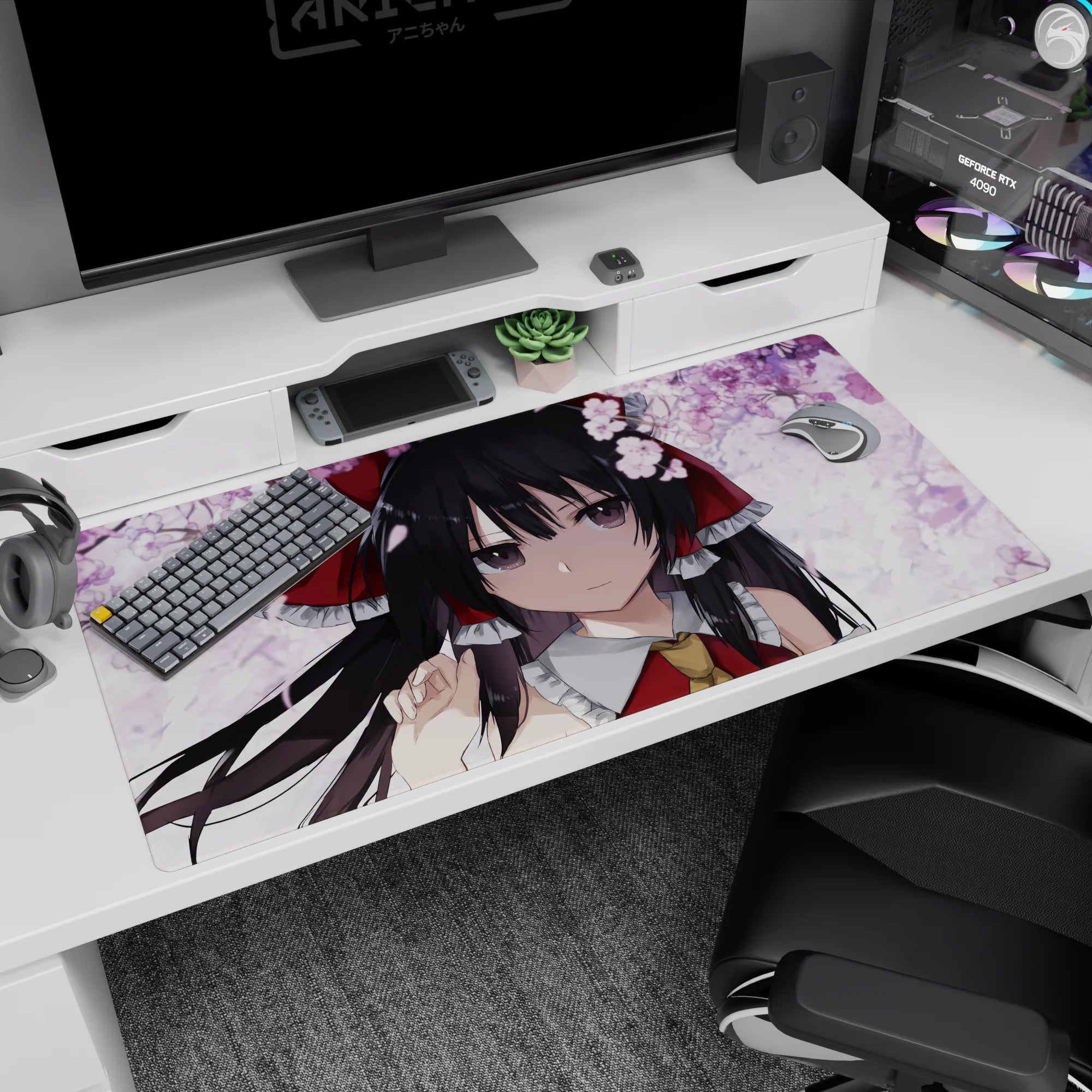 40x20 inches Reimu Hakurei desk pad under drifting cherry blossoms, black hair and big red bow.