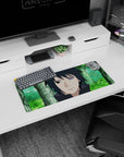 28x12 inches anime mouse pad showing Sasuke Uchiha staring forward, dark hair framing a shining Rinnegan.