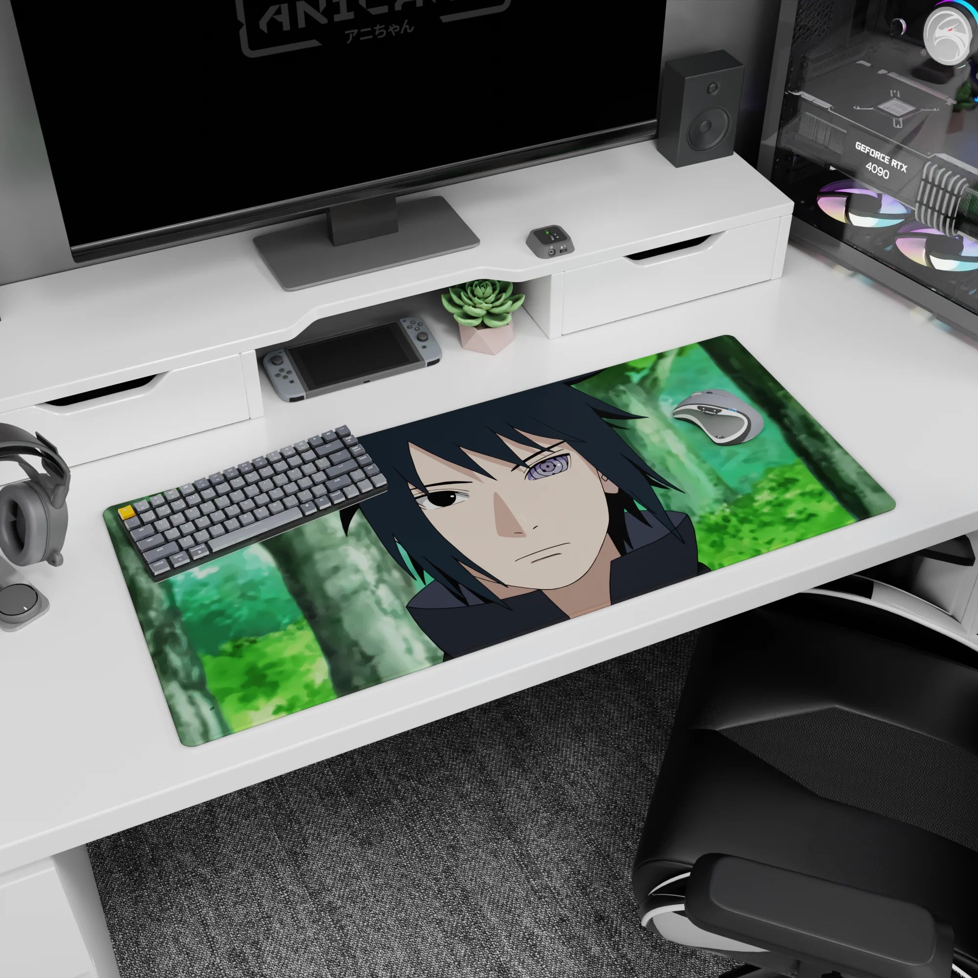 36x16 inches Naruto desk pad showing Sasuke Uchiha staring forward, dark hair framing his glowing Rinnegan.