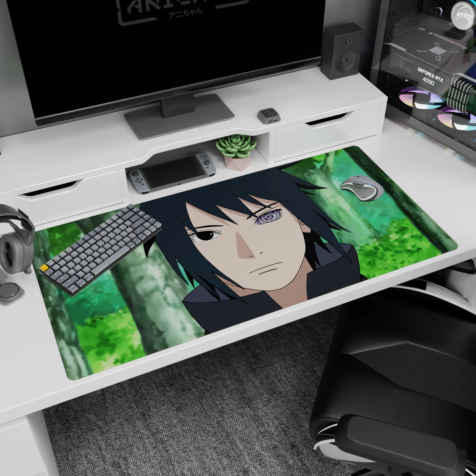 40x20 inches desk pad showing Sasuke Uchiha staring ahead, dark hair framed by blurred green woods.