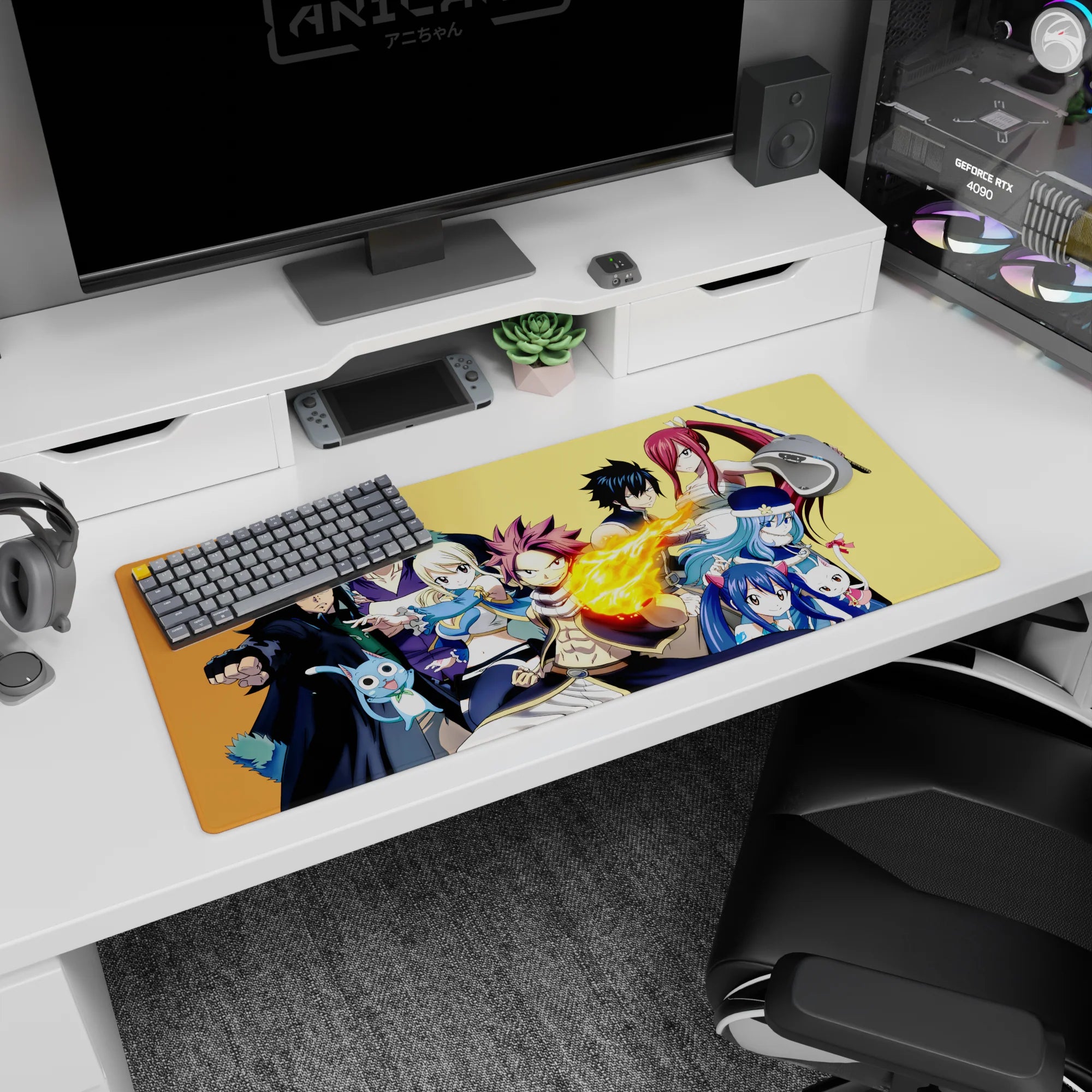 Natsu flame punch front and center on Fairy Tail desk pad 36x16 inches, with Lucy and Erza posed behind.