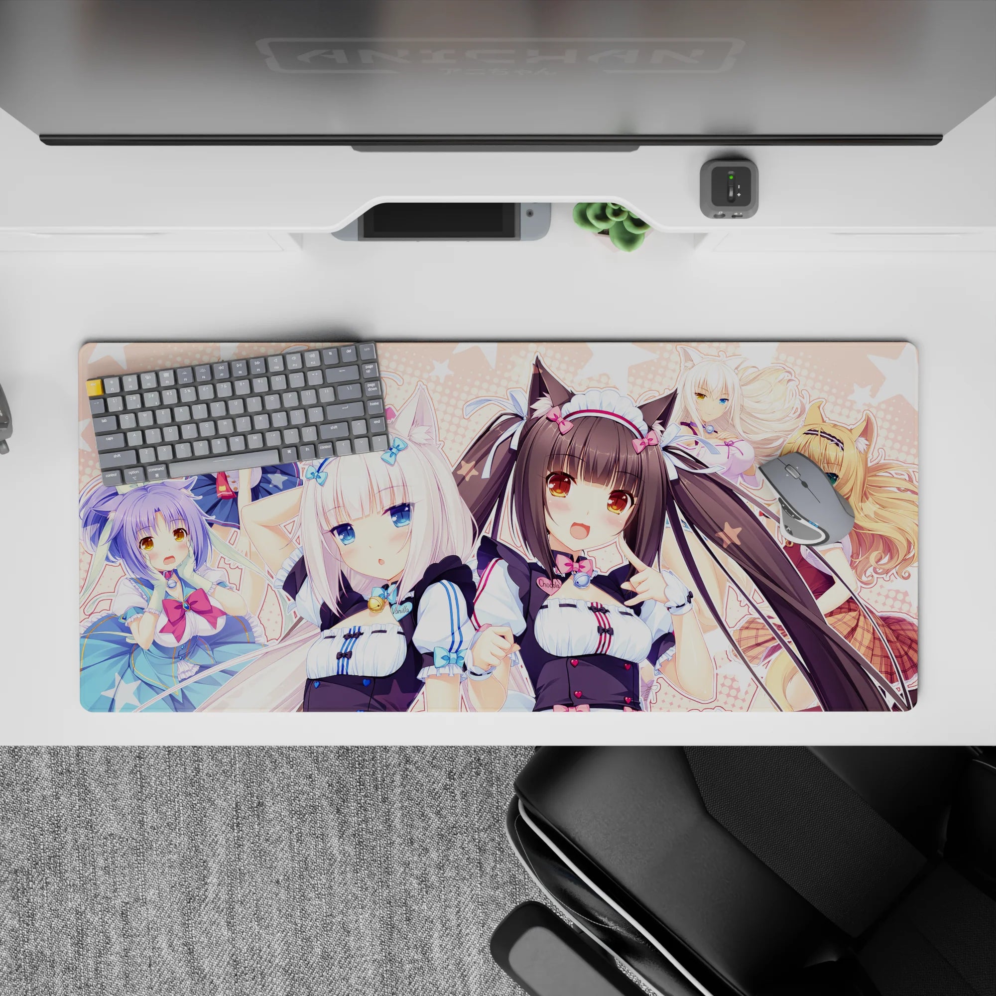 Pastel pink polka dot anime desk pad 36x16 inches, cozy cute catgirl vibe with bright blues and sweets.