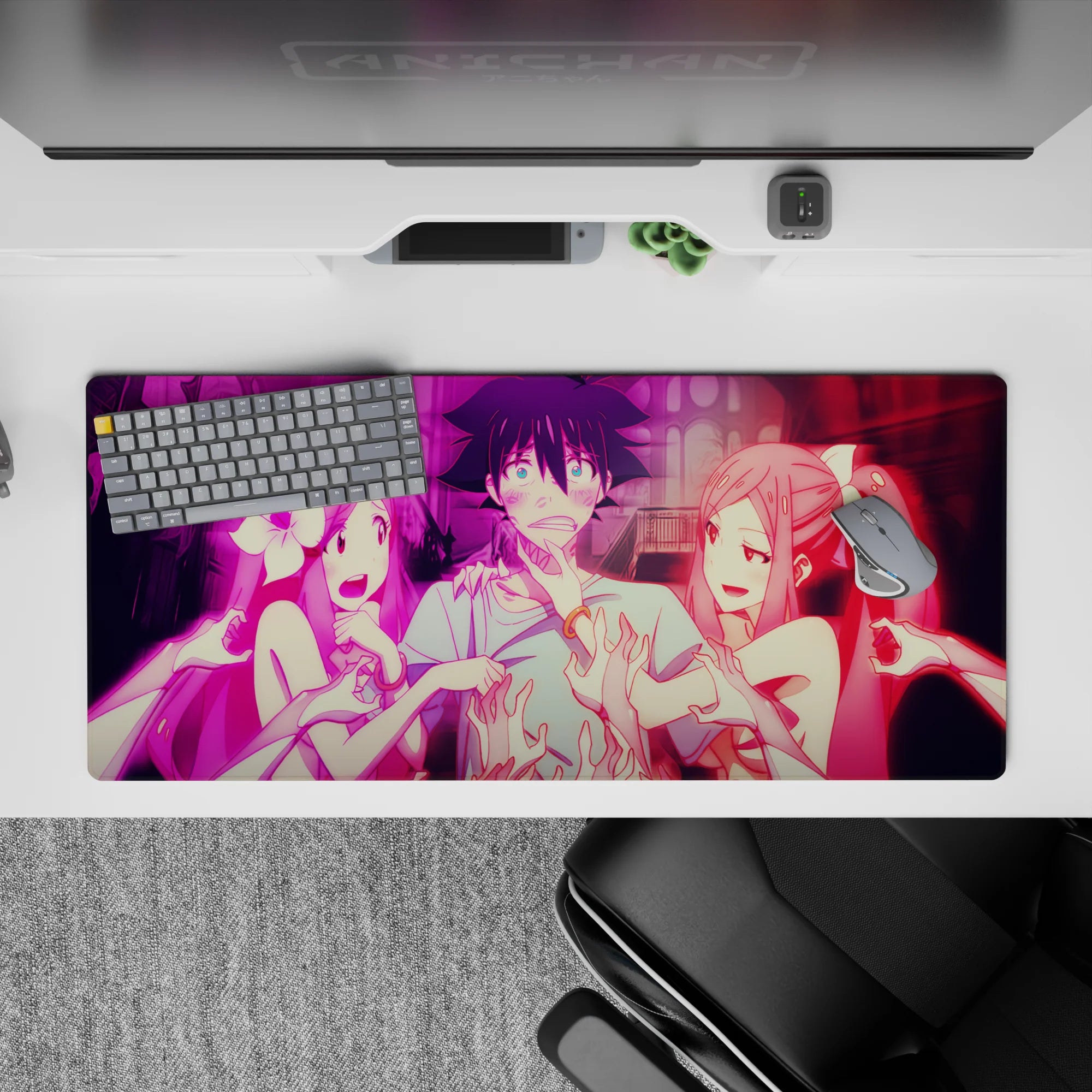 36x16 inches anime desk pad in neon pink chaos, vivid night-pop print with playful teasing energy.