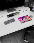 Flustered black-haired guy pulled by two ribbon-bow girls on anime mouse pad 14x10 inches.