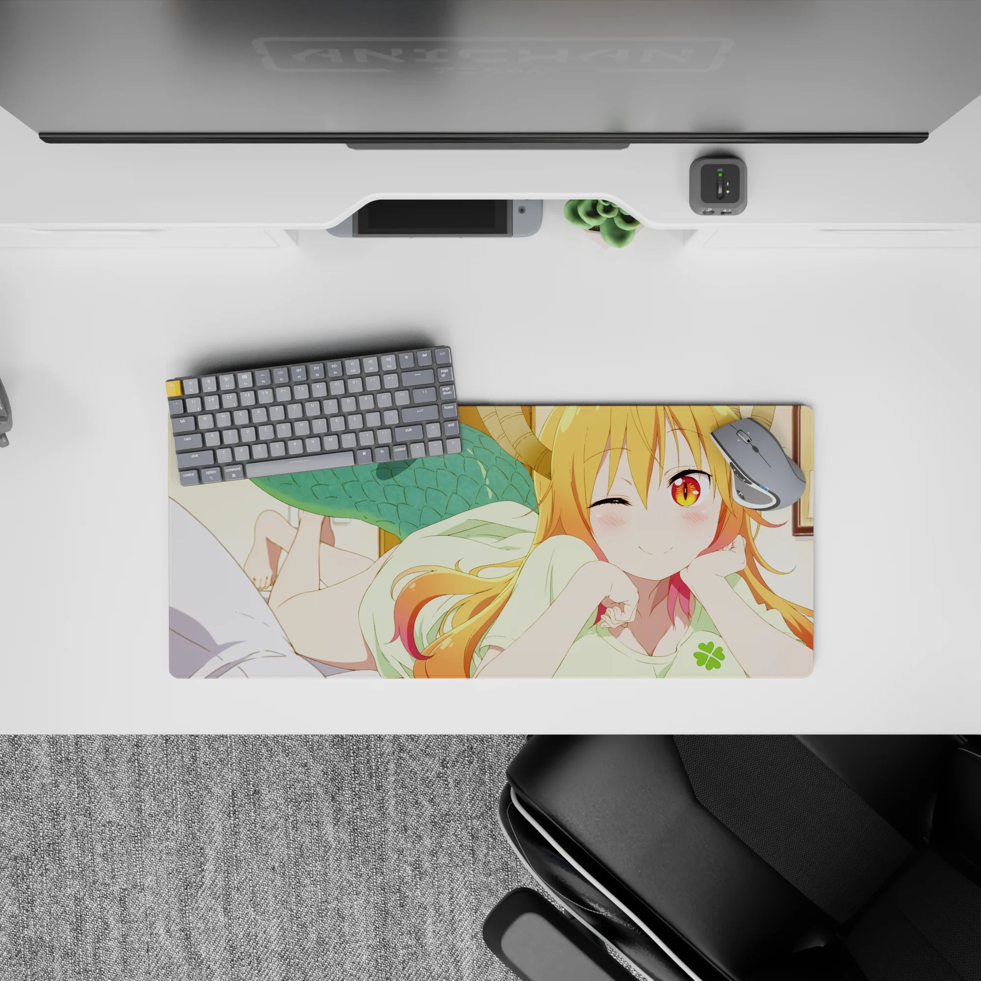 Warm orange-to-pink hair and golden eyes anime girl mouse pad 28x12 inches, cozy playful desk vibe.