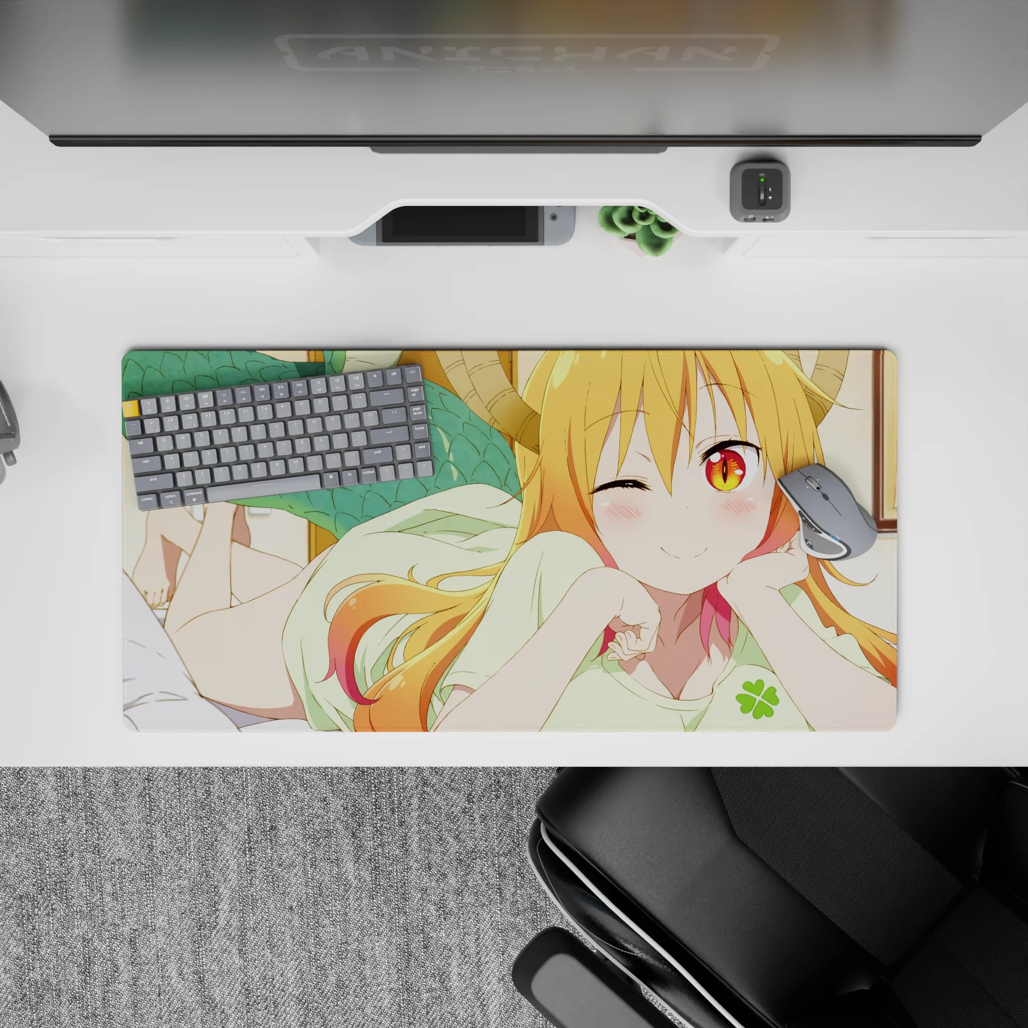 32x16 inches kawaii desk mouse pad in warm orange-to-pink hair tones, golden eyes, cozy mischievous vibe.