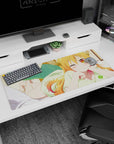 Tohru from Miss Kobayashi's Dragon Maid lounging and winking on a 36x16 inches anime desk pad.