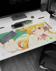 40x20 inches Kobayashi-san Chi no Maid Dragon desk pad featuring Tohru lounging and winking.