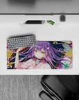 28x12 inches kawaii desk mat in teal, gold, and pink with cozy mischievous festival-night vibe.