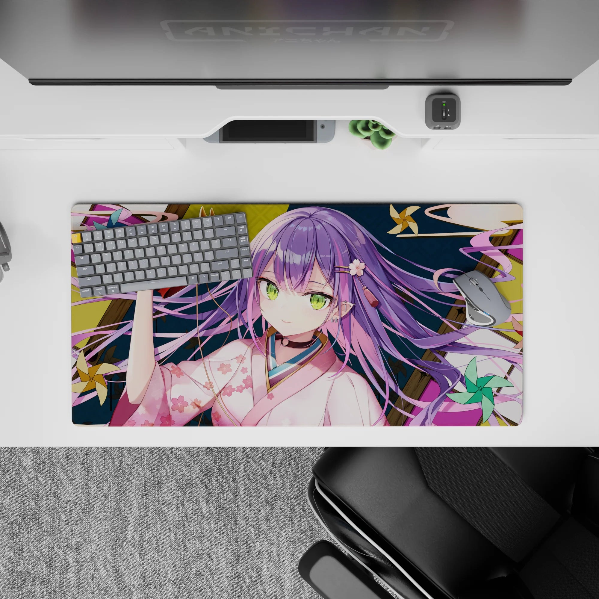 32x16 inches anime mouse pad in pink, teal, and gold with cozy mischievous festival-night vibe.