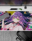 Cozy mischievous anime desk pad 40x20 inches in pink, teal, gold, with green eyes and festival charm.