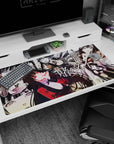 Yumeko Jabami Kakegurui desk pad, sly smile and flowing hair across manga panels, 40x20 inches.