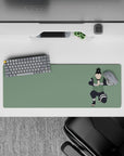 Sage green 32x12 inches anime desk mat with calm chill vibe and crisp black shapes for smooth tracking.
