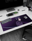 Sasuke Uchiha staring forward on anime desk pad 36x16 inches, crimson Sharingan and katana slash.