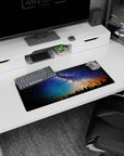 Star-speckled 28x12 inches mouse pad with pine silhouettes and a glowing horizon under the Milky Way.